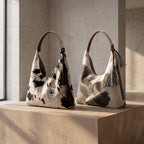 Bolsa Hobo de pelo de vaca artesanal, vista lateral — INALIA Leather
