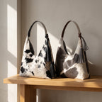 Bolsa Hobo de pelo de vaca bajo luz natural — INALIA Leather