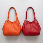 Bolsas Serena de piel Floater en Naranja y Rojo, edición Tonos Vibrantes